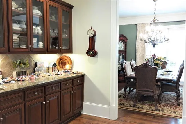 a kitchen with a table and chairs in it