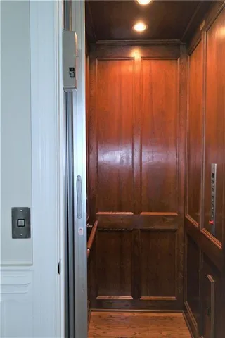 a picture of a bench in a white building