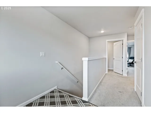 a view of a livingroom with a staircase