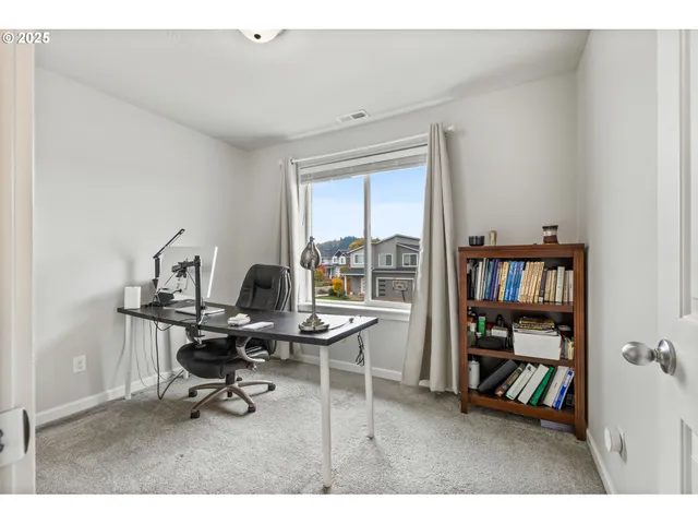 a workspace with a bookshelf