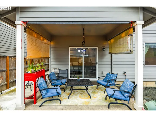 a view of swimming pool with outdoor seating