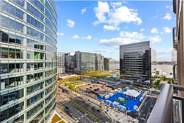 a view of a city with tall buildings