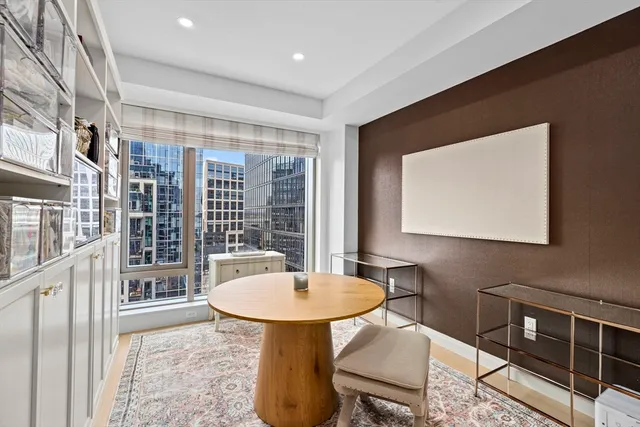 a bathroom with a sink a toilet and shower curtain