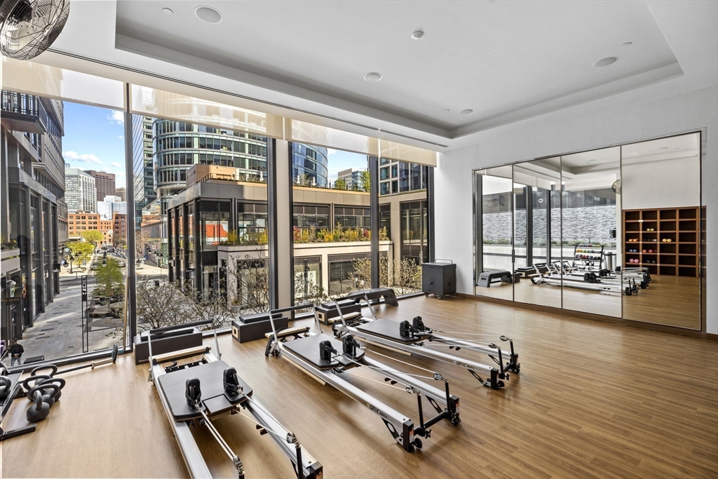 133 Seaport Boulevard, Unit 1603 Boston, MA 02210 - Photo 20 of 32 a view of a room with gym equipment