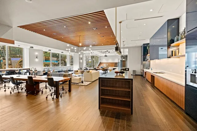 a view of a living room and dining room