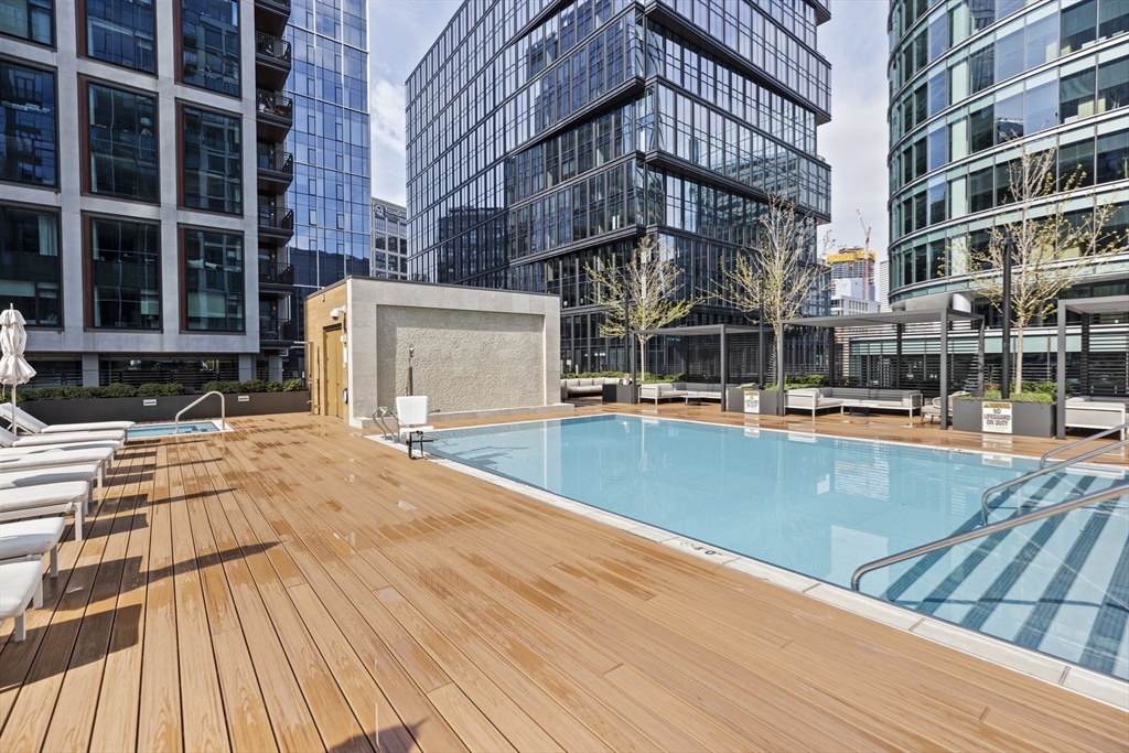 133 Seaport Boulevard, Unit 1603 Boston, MA 02210 - Photo 25 of 32 a view of a building with a swimming pool