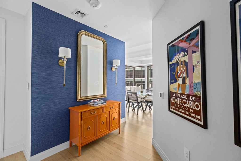 133 Seaport Boulevard, Unit 1603 Boston, MA 02210 - Photo 5 of 32 an entryway with wooden floor