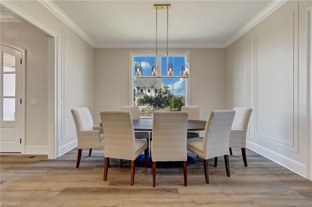 6806 Brennan Way Oak Ridge, NC 27310 - Photo 16 of 50 dining room with space for plenty of guests