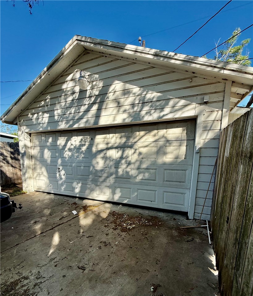 4010 Lowman Street Corpus Christi, TX 78411 - Photo 4 of 33 TWO CAR GARAGE W/GARAGE DOOR OPENER