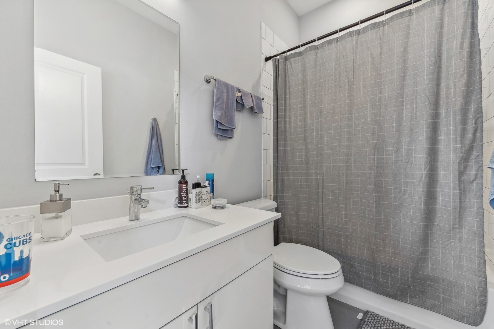 3719 North Seminary Avenue Chicago, IL 60613 - Photo 16 of 26 a bathroom with a sink a toilet and shower