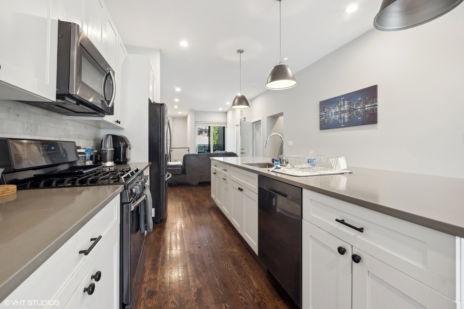3719 North Seminary Avenue Chicago, IL 60613 - Photo 23 of 26 a kitchen with stainless steel appliances a sink stove and refrigerator