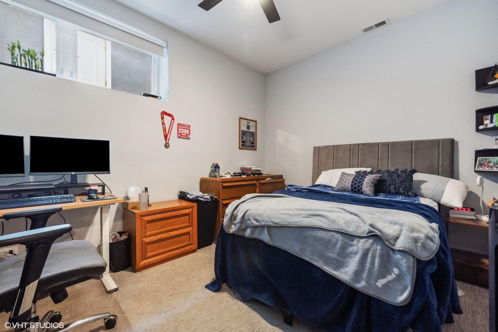 3719 North Seminary Avenue Chicago, IL 60613 - Photo 24 of 26 a bedroom with bed and a flat screen tv