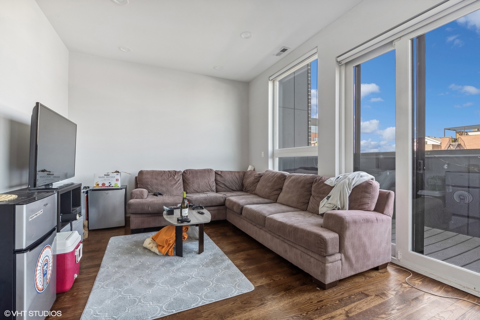 3719 North Seminary Avenue Chicago, IL 60613 - Photo 3 of 26 a living room with furniture and a flat screen tv