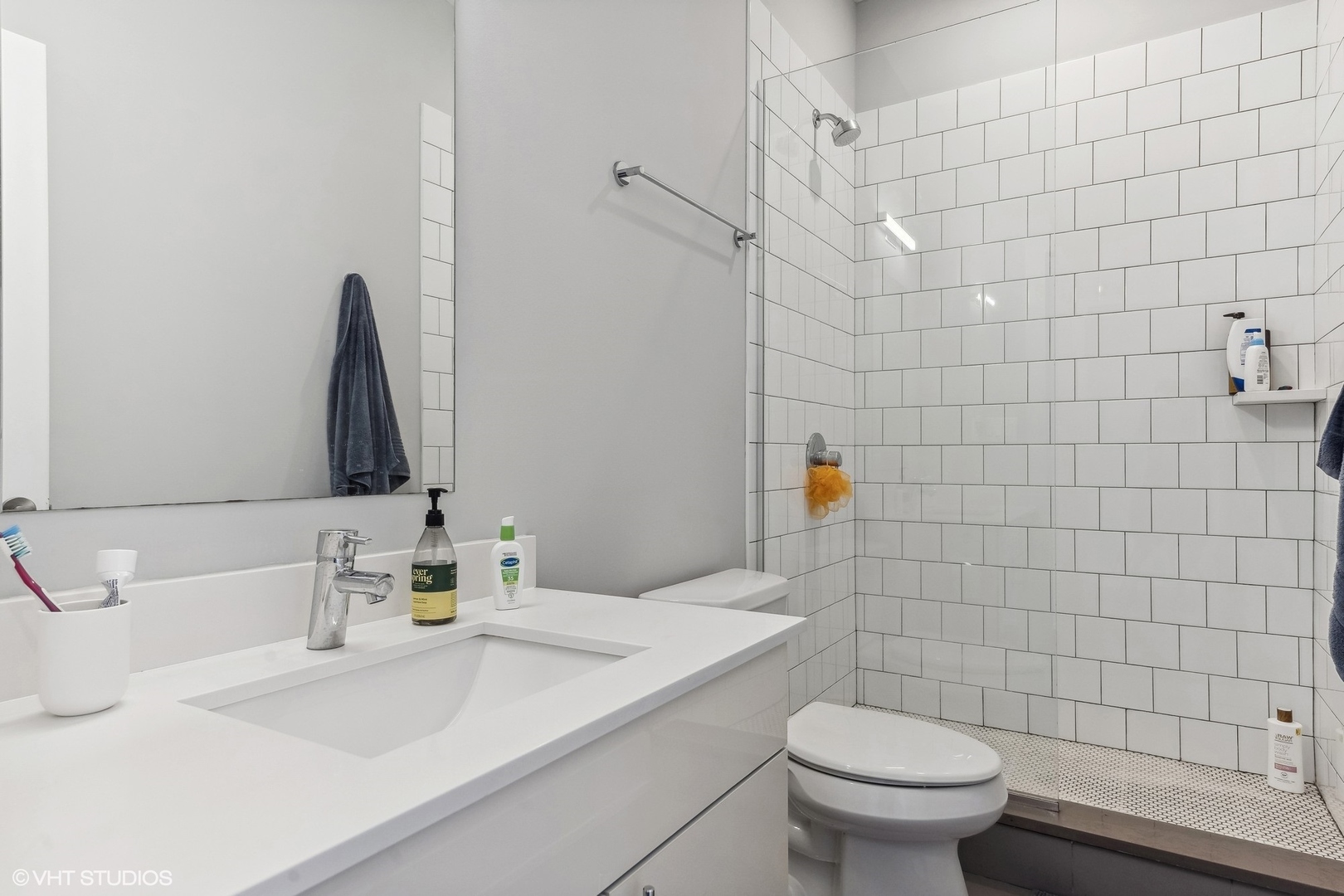 3719 North Seminary Avenue Chicago, IL 60613 - Photo 10 of 26 a bathroom with a sink toilet and shower
