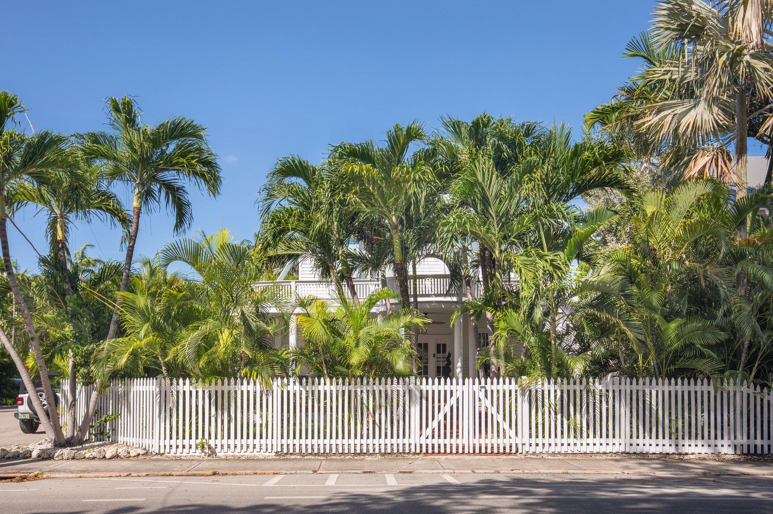 1420 White Street Key West, FL 33040 - Photo 2 of 48 a front view of a house with a garden