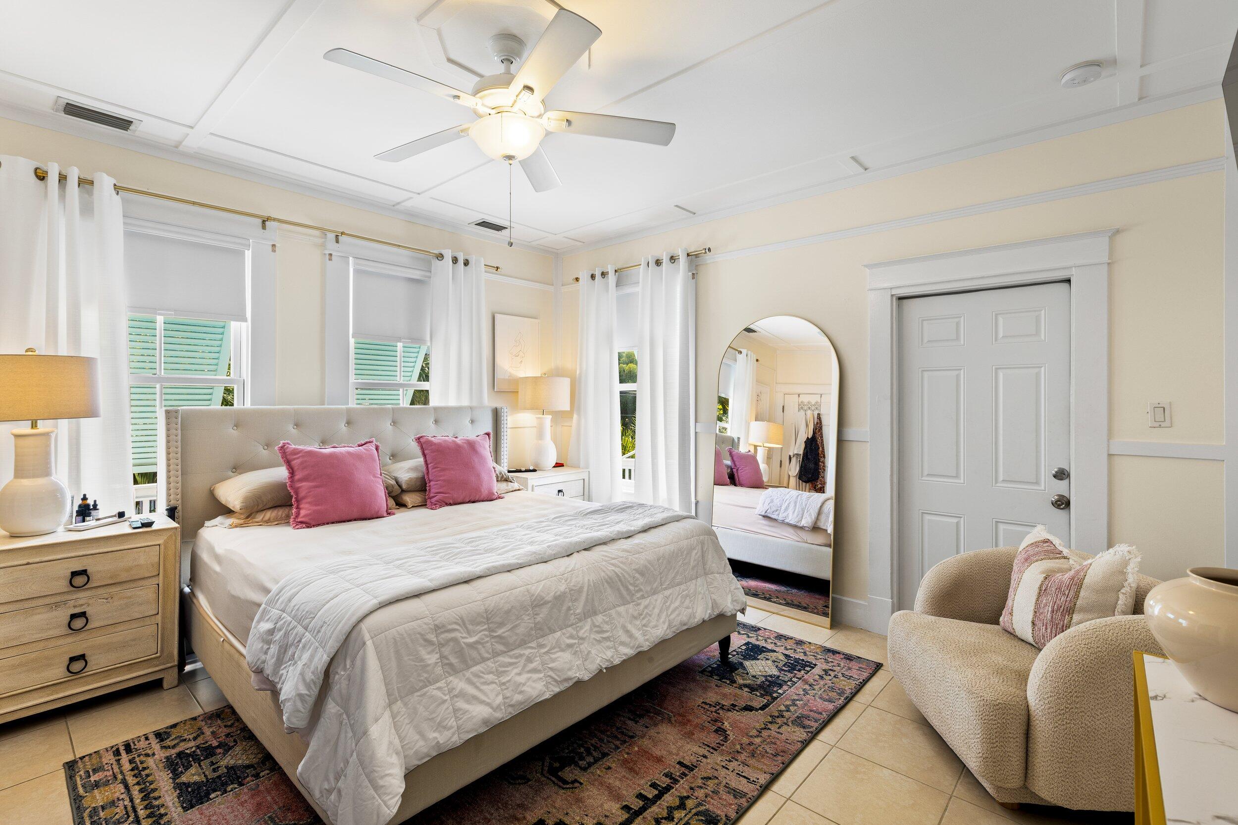 1420 White Street Key West, FL 33040 - Photo 25 of 48 a bedroom with a bed couches and window