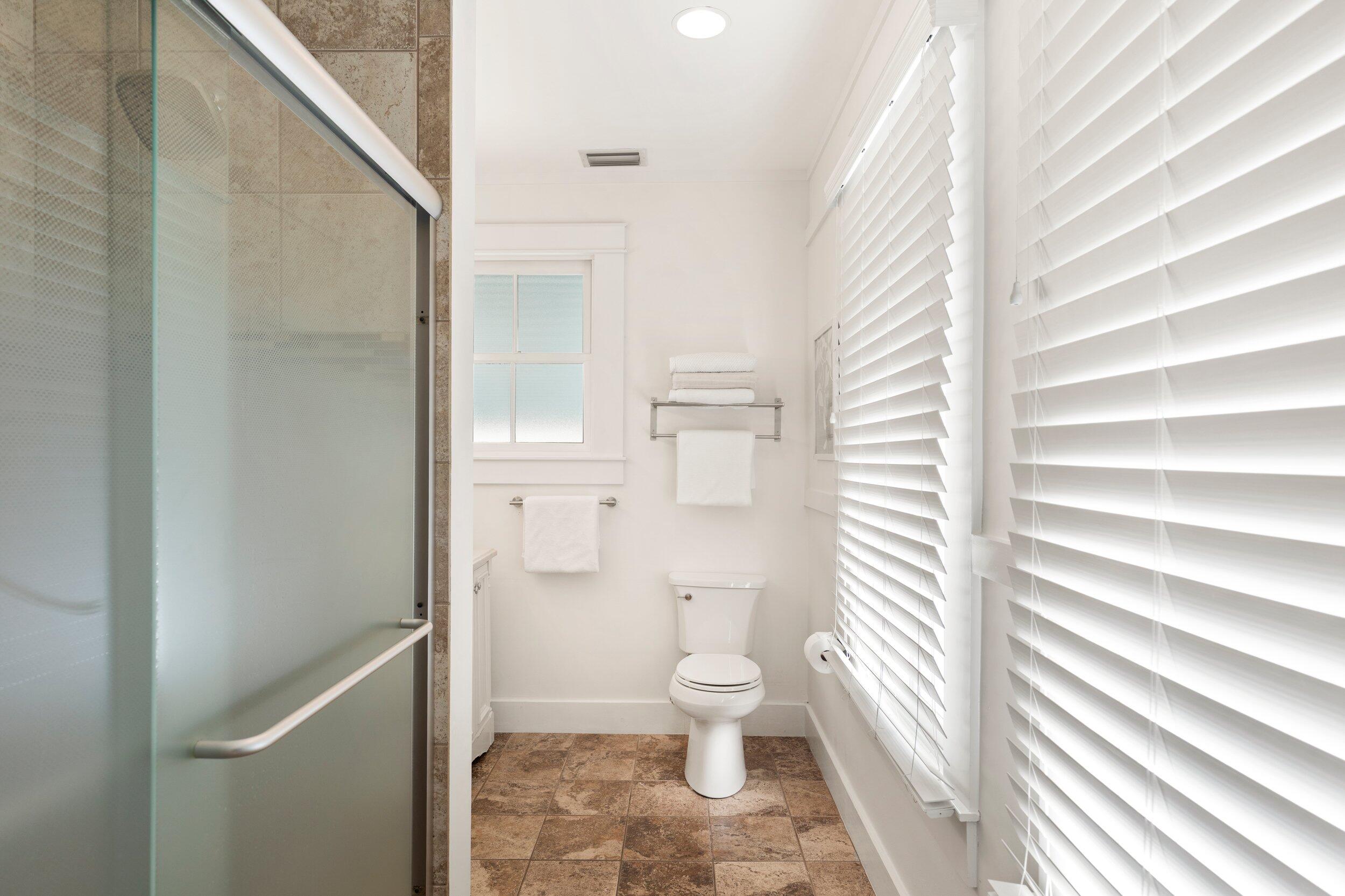 1420 White Street Key West, FL 33040 - Photo 28 of 48 a bathroom with a toilet and a shower