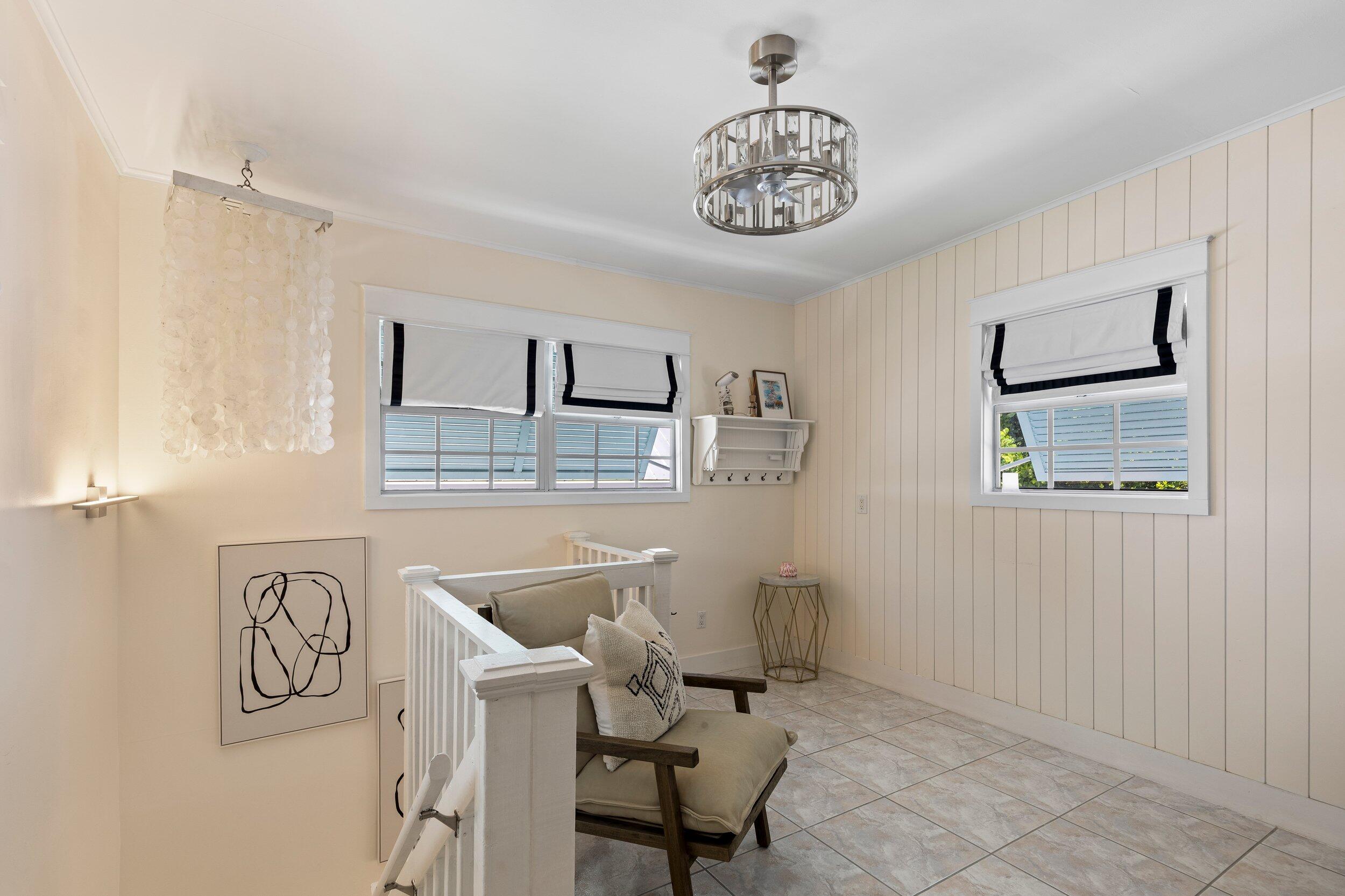 1420 White Street Key West, FL 33040 - Photo 37 of 48 a living room with furniture and a table