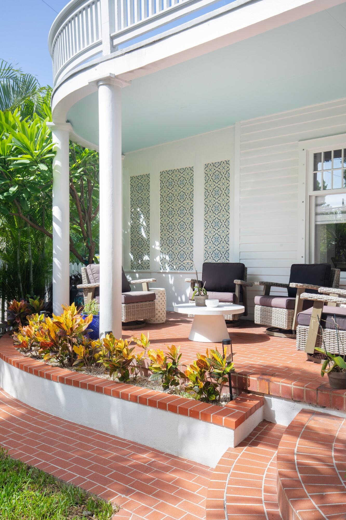 1420 White Street Key West, FL 33040 - Photo 4 of 48 a living room filled with furniture hardwood floor and a table