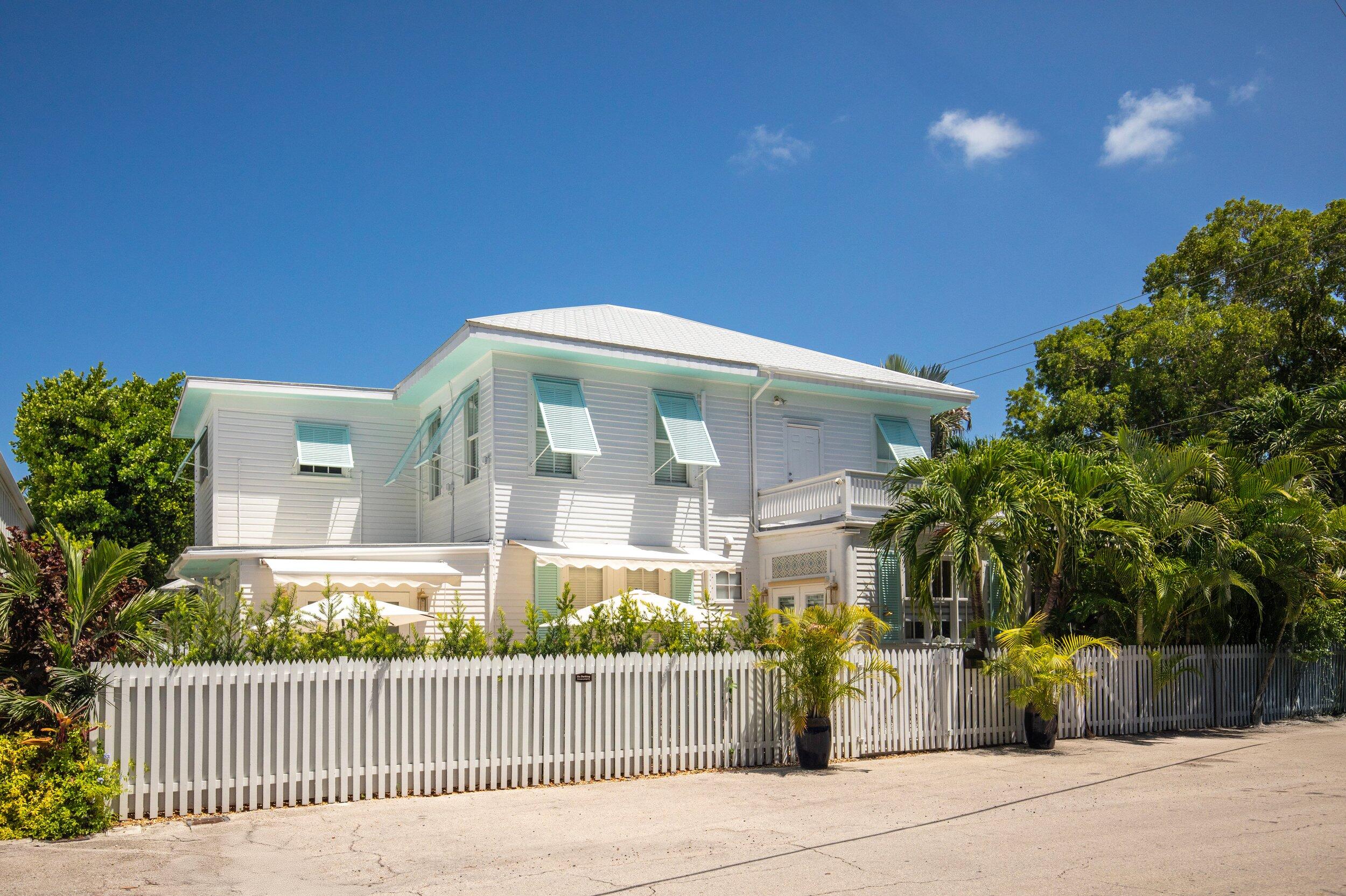 1420 White Street Key West, FL 33040 - Photo 46 of 48 a front view of a house with a garden