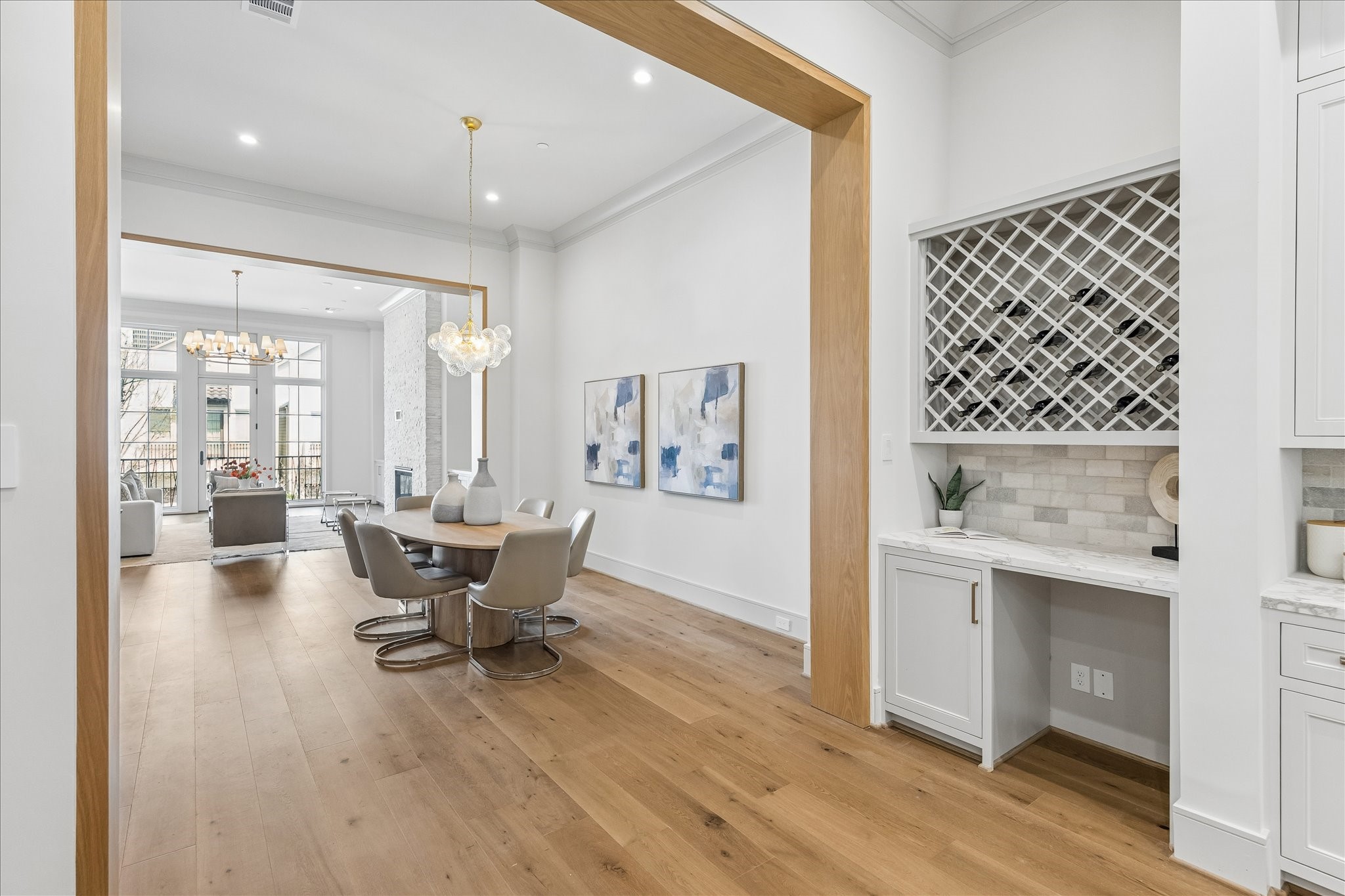 1215 West Pierce Street Houston, TX 77019 - Photo 11 of 37 Between the dining room and the kitchen is a butler's pantry with a spot for the to-be-installed beverage cooler.