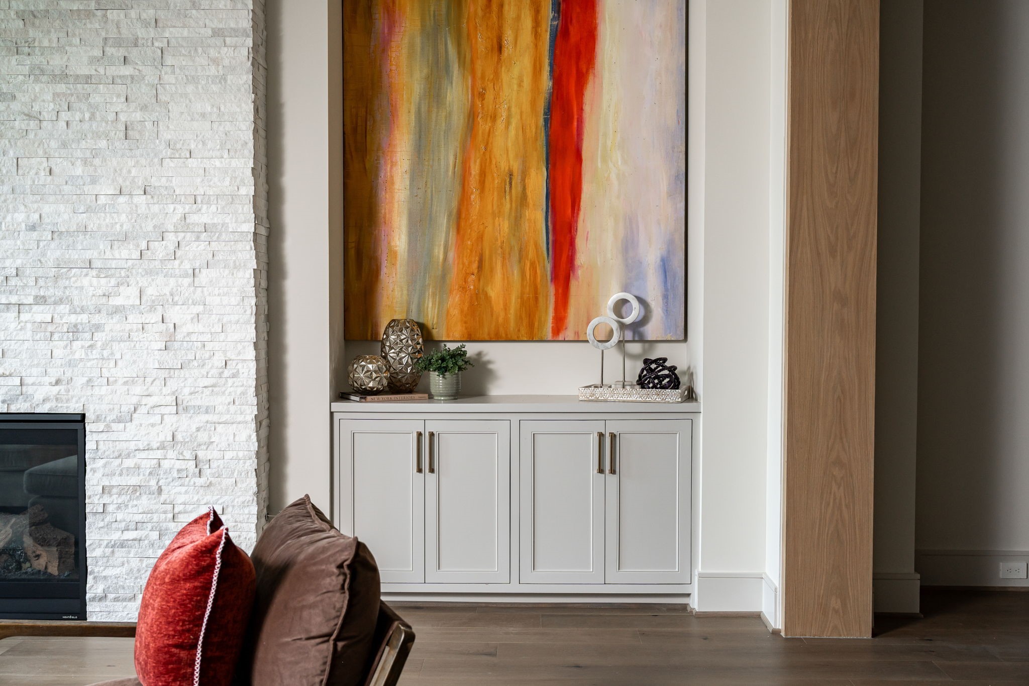 1215 West Pierce Street Houston, TX 77019 - Photo 20 of 37
Site-built custom cabinetry with inset doors and soft-close hinges hide your audiovisual equipment, games, blankets, and more.