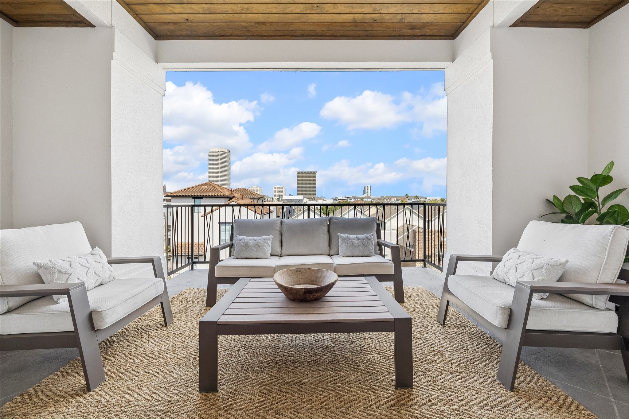 1215 West Pierce Street Houston, TX 77019 - Photo 28 of 37 The covered terrace off of the City Room has plenty of room for relaxing furniture or a dining table. Pre-wired with gas and water for outdoor kitchen, as well as for speakers and TV, this will soon become a favorite spot.
