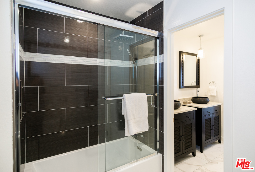 1085 West Kensington Road Los Angeles, CA 90026 - Photo 13 of 23 a bathroom with a shower