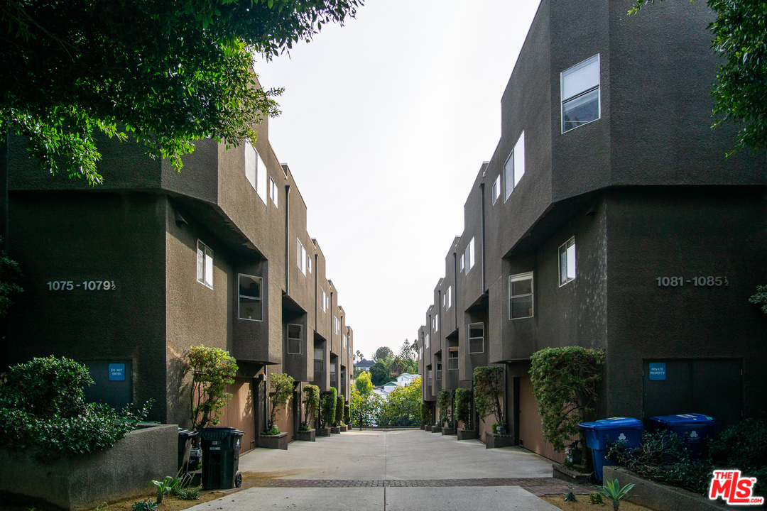 1085 West Kensington Road Los Angeles, CA 90026 - Photo 18 of 23 a street view along with residential houses