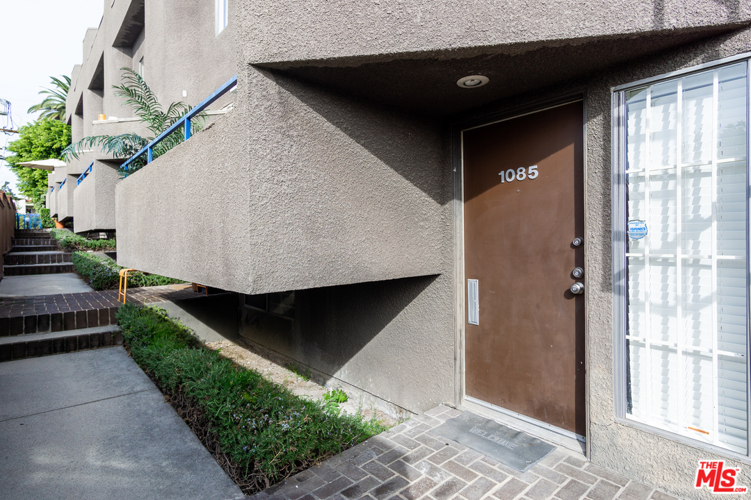 1085 West Kensington Road Los Angeles, CA 90026 - Photo 23 of 23 a front view of a house with entryway