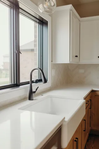 a view of a sink and washer in a room
