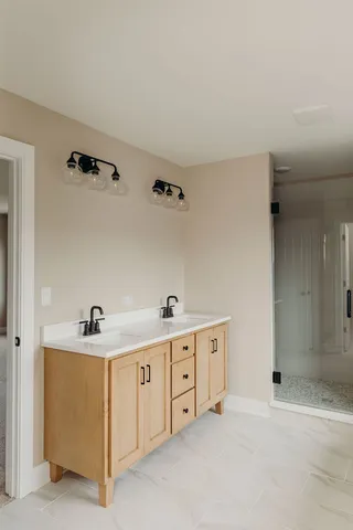 a bathroom with a sink and a mirror