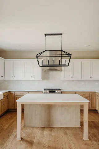 a view of kitchen with wooden floor