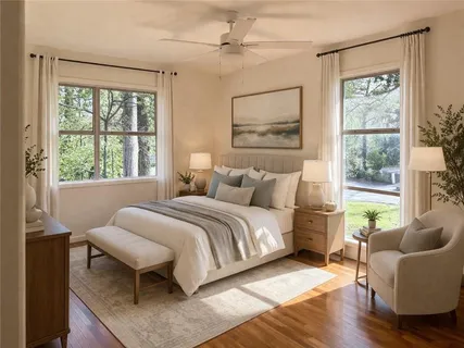 a bedroom with a bed and a couch