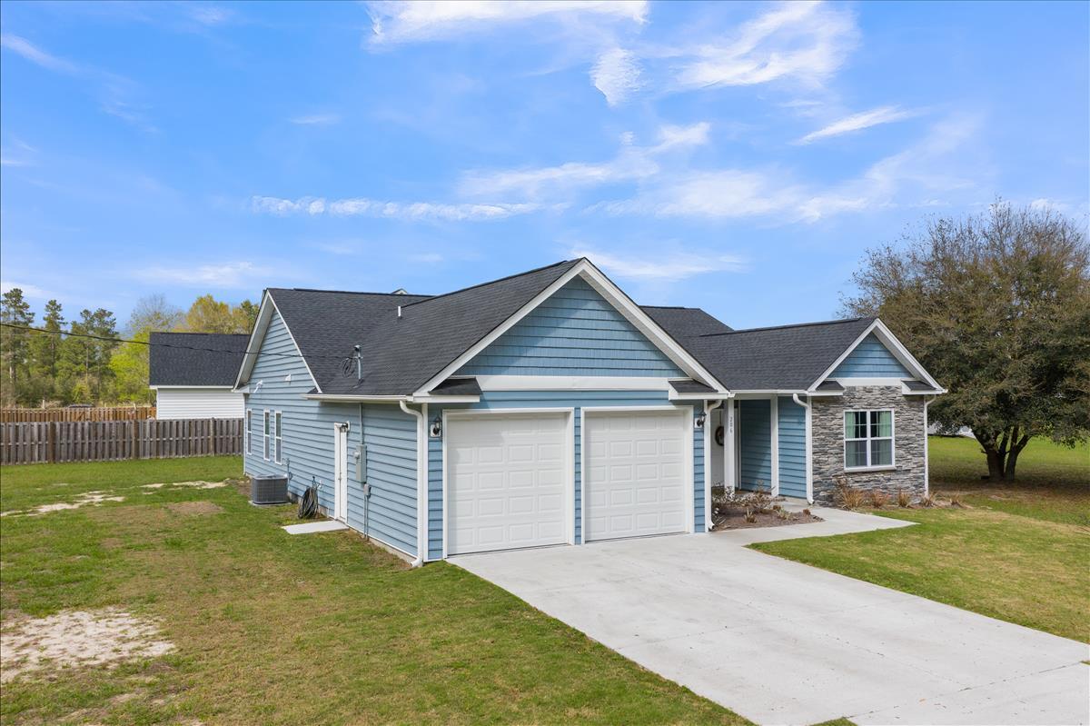 206 New Iris Lane Ridgeville, SC 29472 - Photo 6 of 31 206 new iris lane front exterior garage