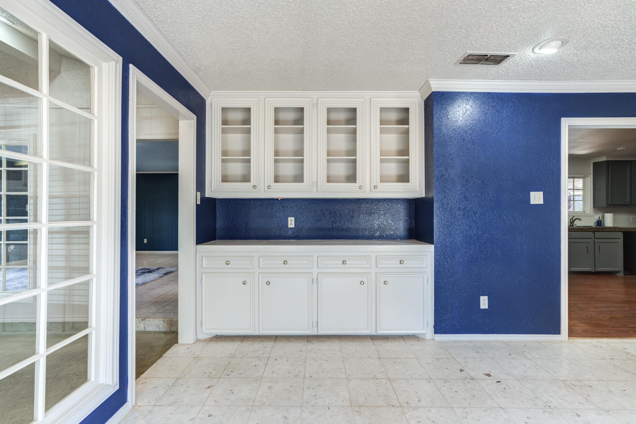 4629 88th Street Lubbock, TX 79424 - Photo 15 of 60 a view of kitchen with granite countertop cabinets and wooden floor