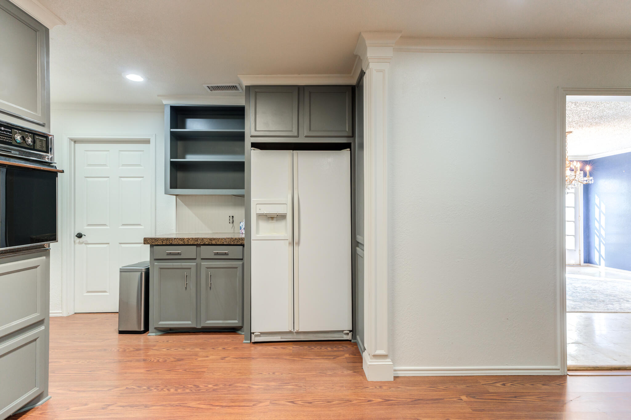 4629 88th Street Lubbock, TX 79424 - Photo 22 of 60 a kitchen with stainless steel appliances a refrigerator and a stove top oven