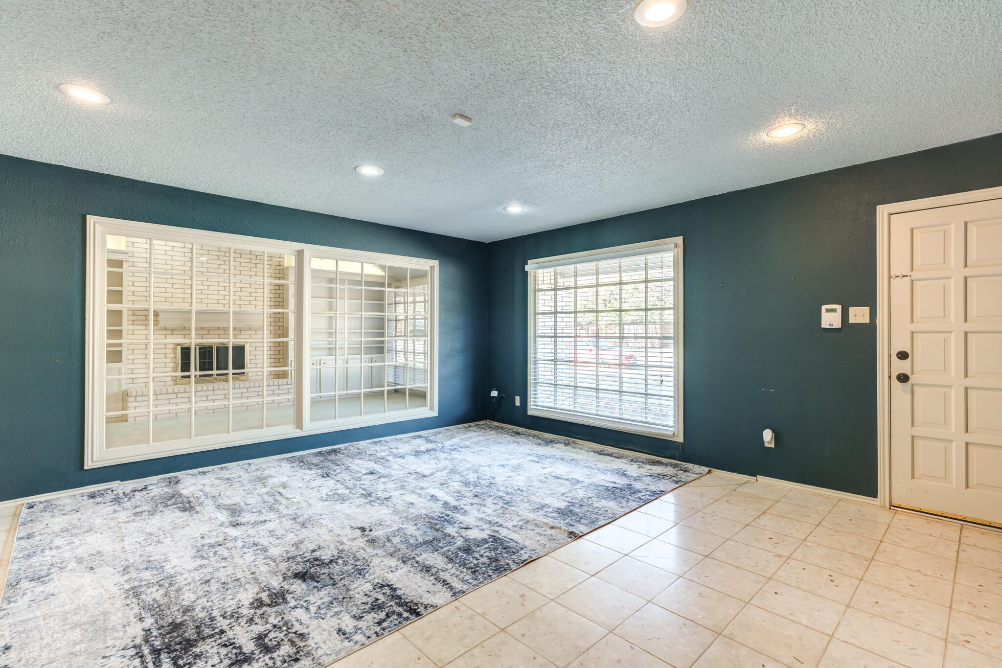 4629 88th Street Lubbock, TX 79424 - Photo 26 of 60 a view of an empty room with a window