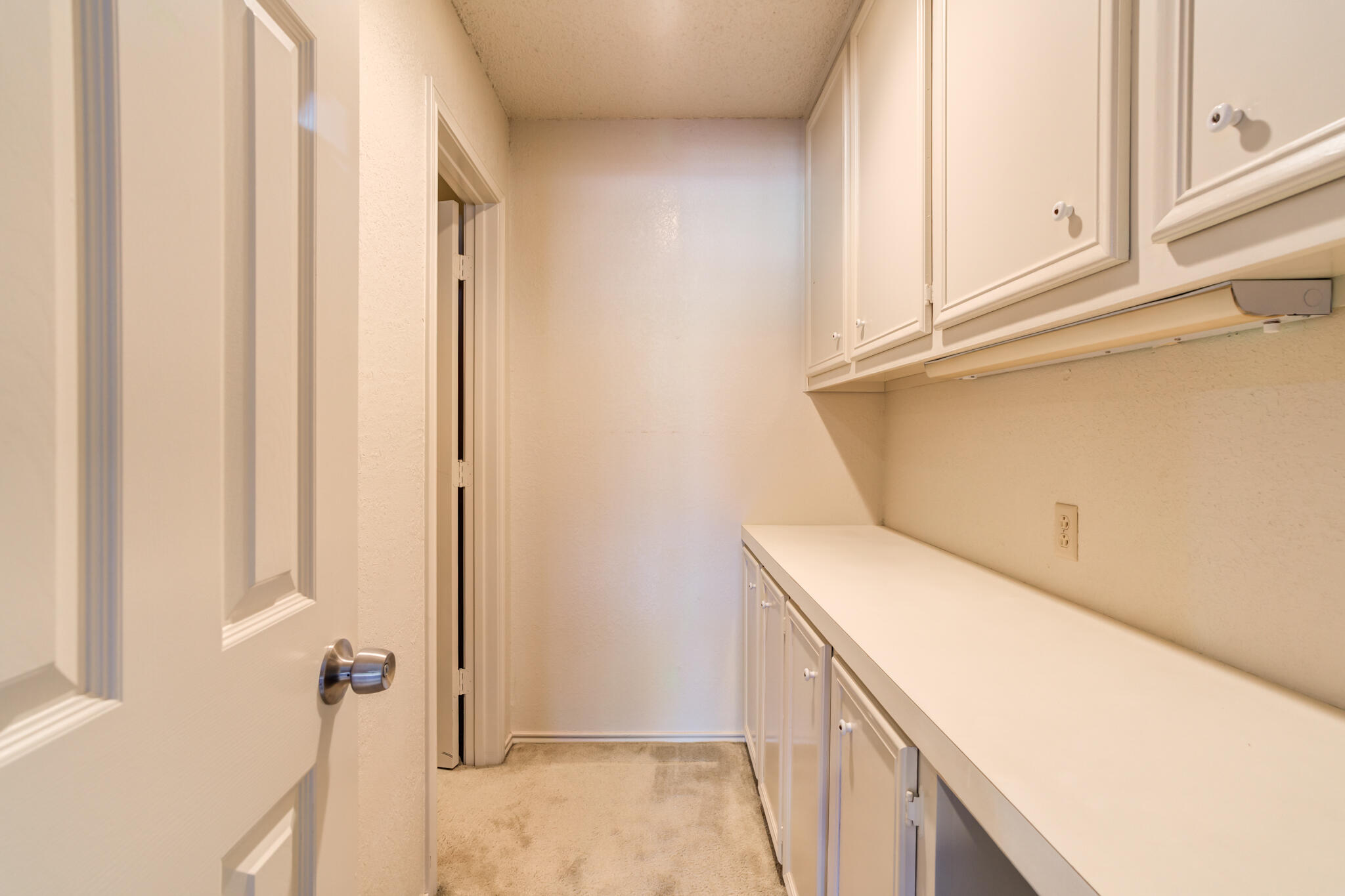 4629 88th Street Lubbock, TX 79424 - Photo 31 of 60 a utility room with dryer and washer
