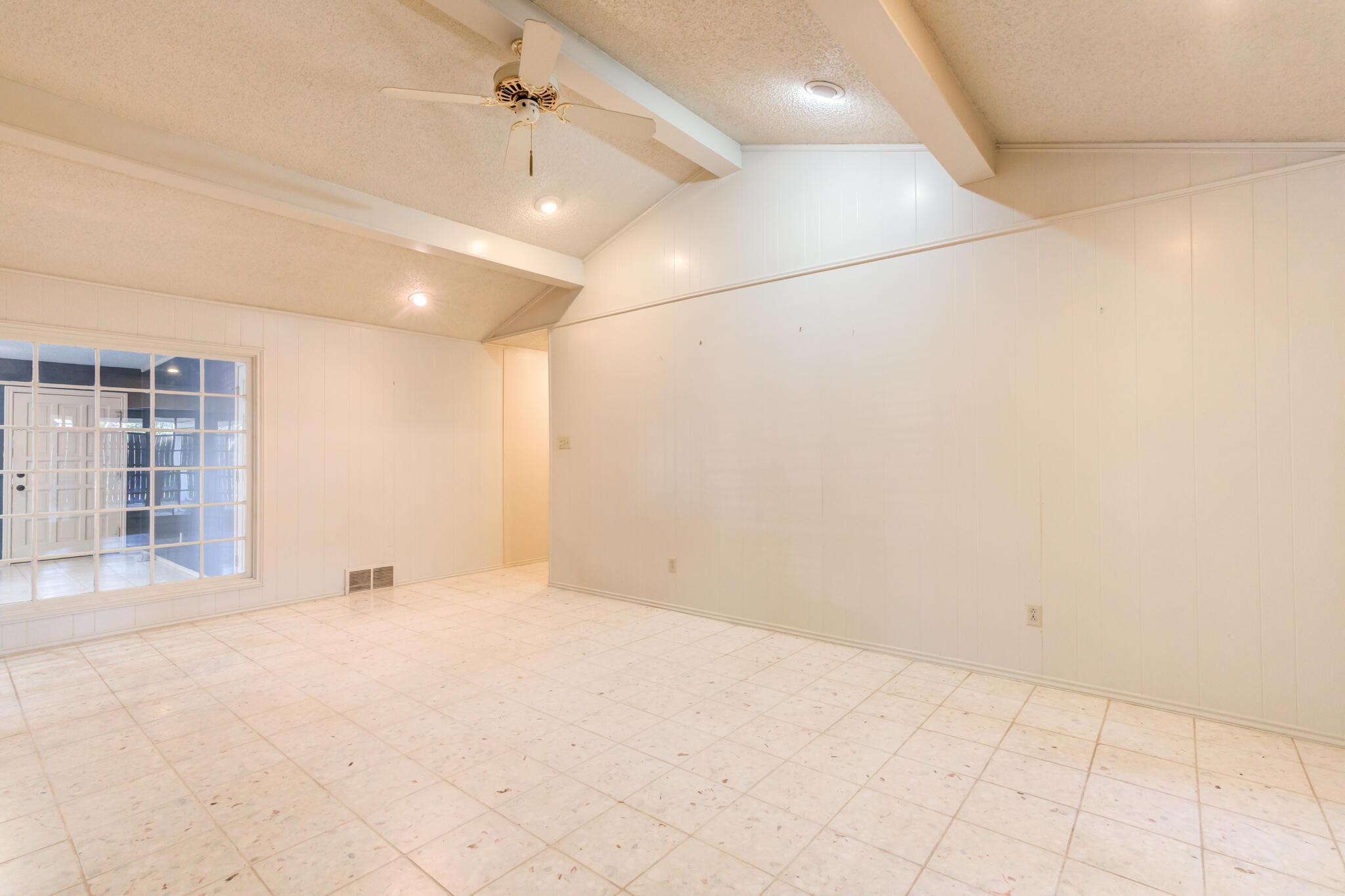 4629 88th Street Lubbock, TX 79424 - Photo 36 of 60 a view of an empty room with a window