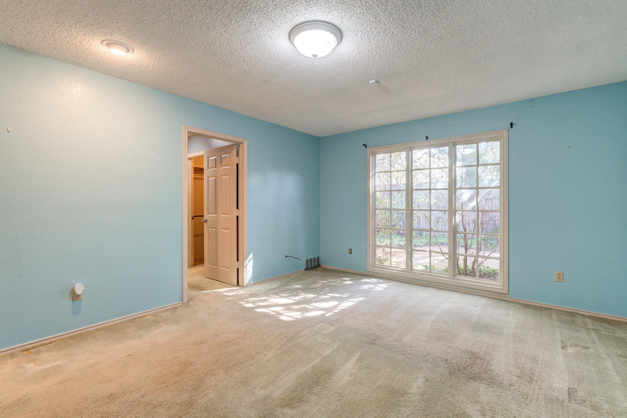 4629 88th Street Lubbock, TX 79424 - Photo 39 of 60 an empty room with a window