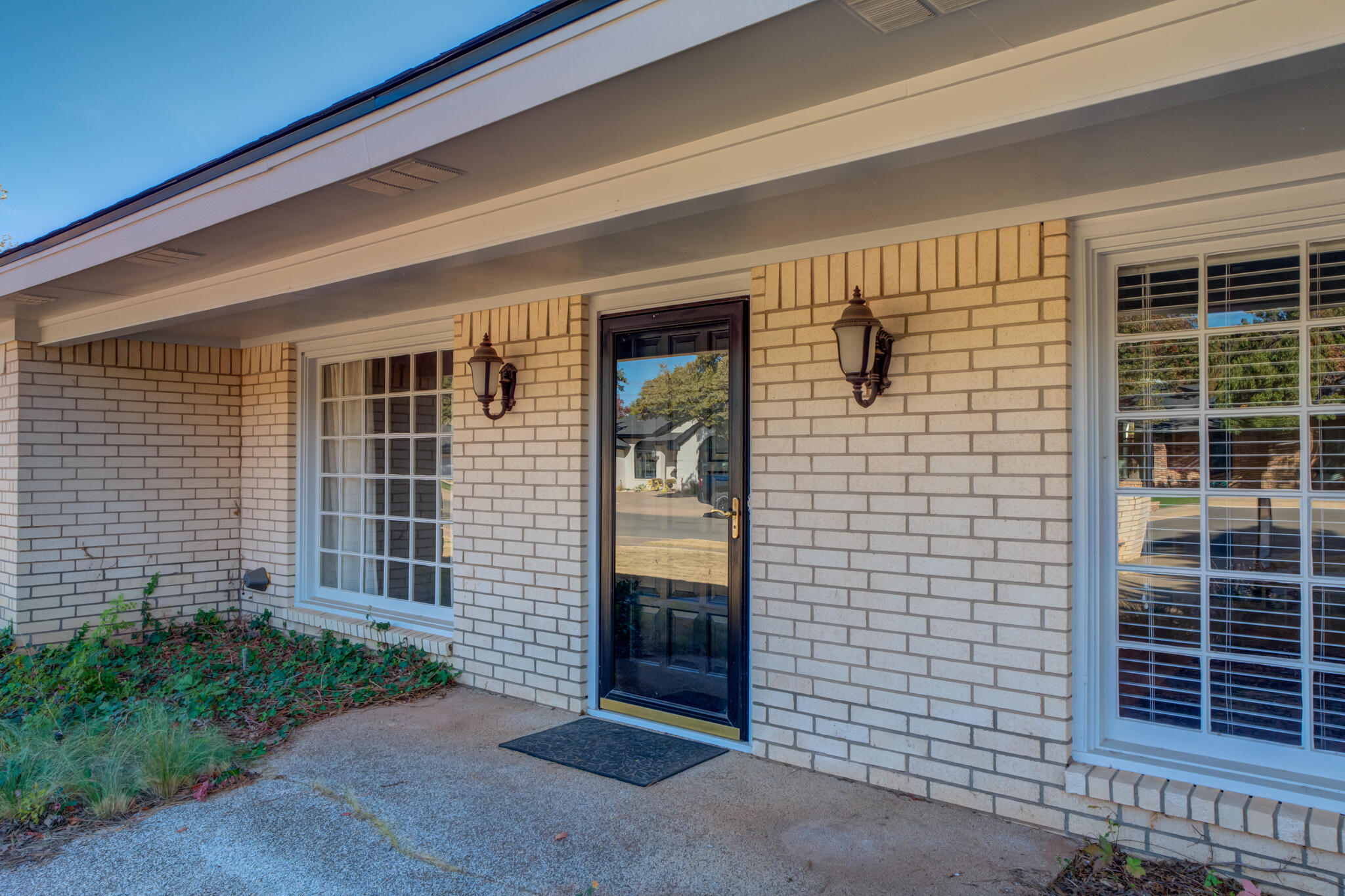 4629 88th Street Lubbock, TX 79424 - Photo 4 of 60 a front view of a house with a large window