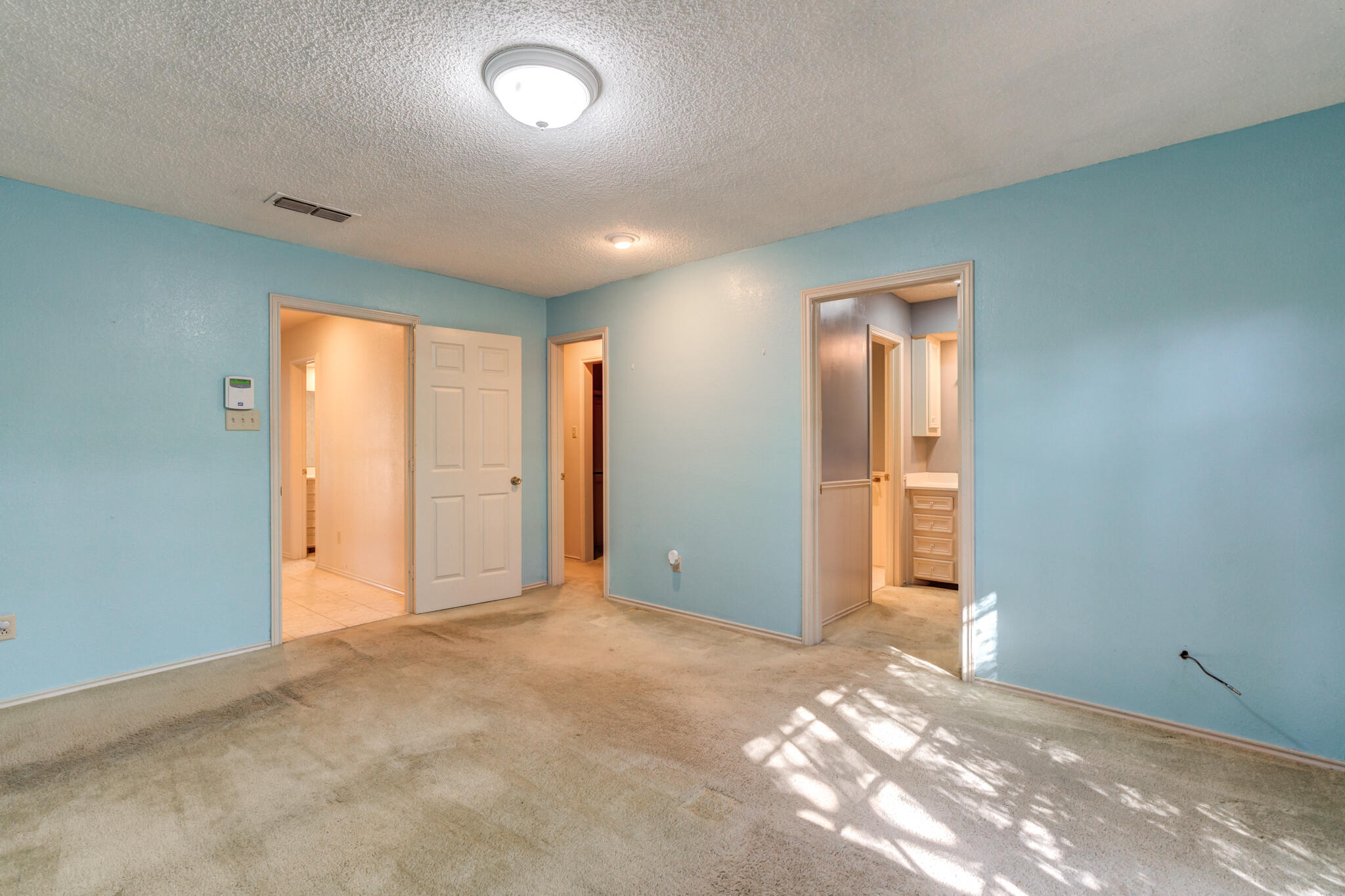 4629 88th Street Lubbock, TX 79424 - Photo 41 of 60 a view of an empty room and a window