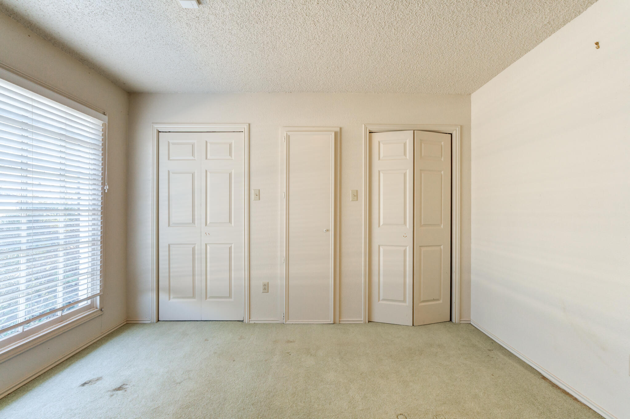 4629 88th Street Lubbock, TX 79424 - Photo 48 of 60 an empty room with windows