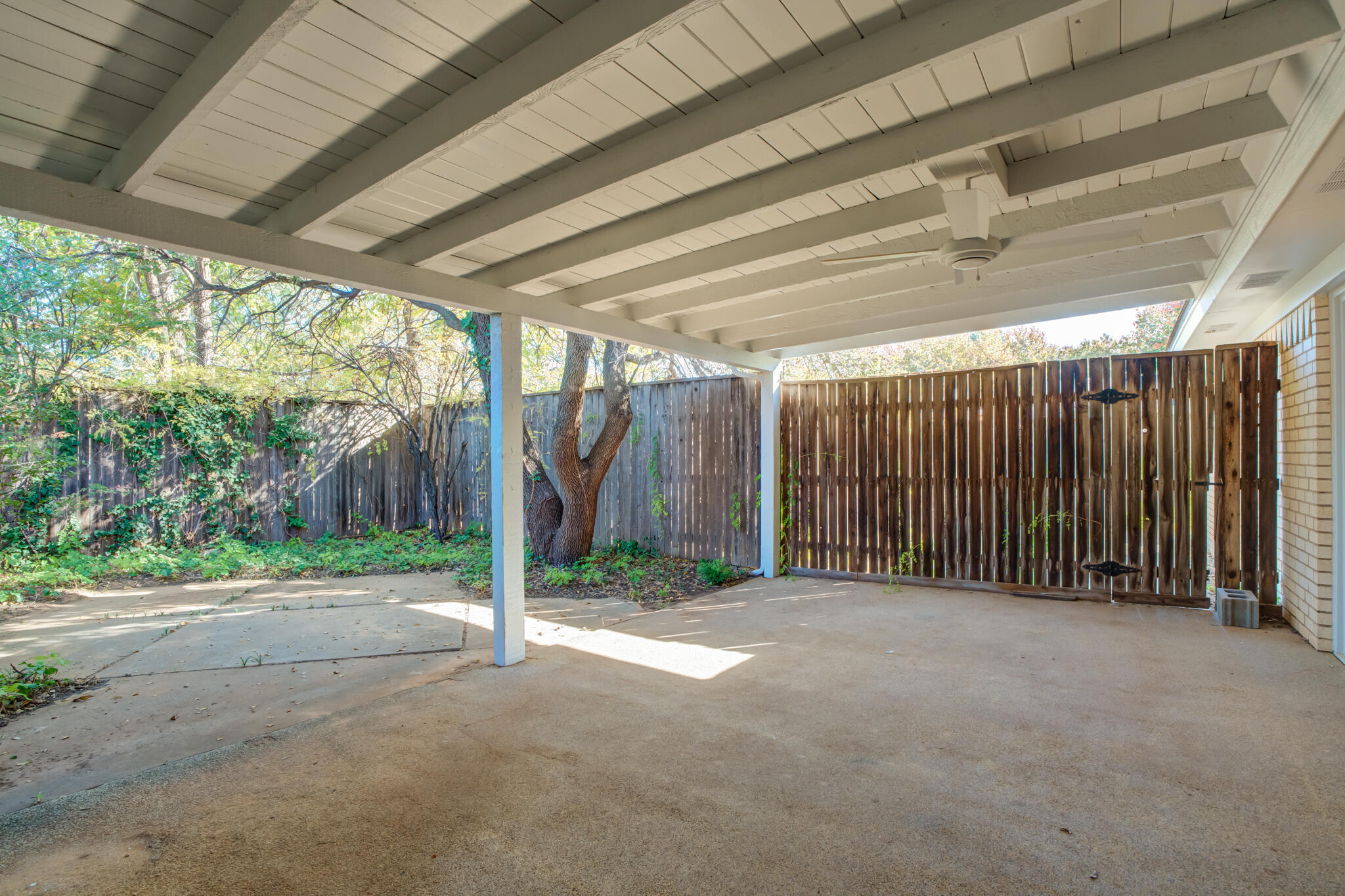 4629 88th Street Lubbock, TX 79424 - Photo 57 of 60 a view of a room with wooden walls