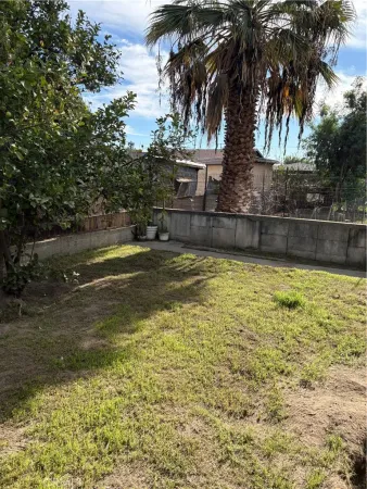 a view of a swimming pool with a house