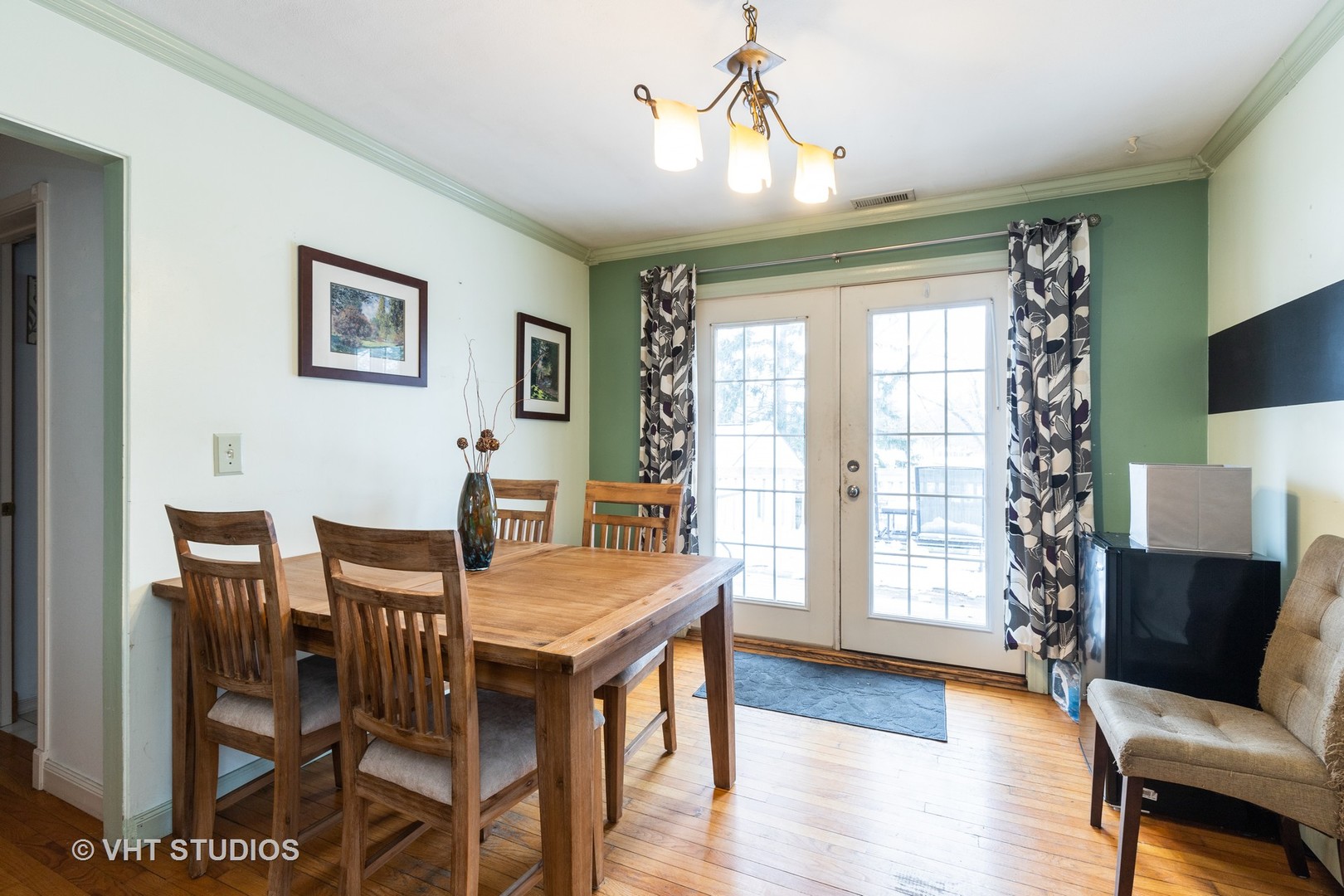 26649 West Wilmot Road Antioch, IL 60002 - Photo 6 of 13 a view of a dining room with furniture and wooden floor