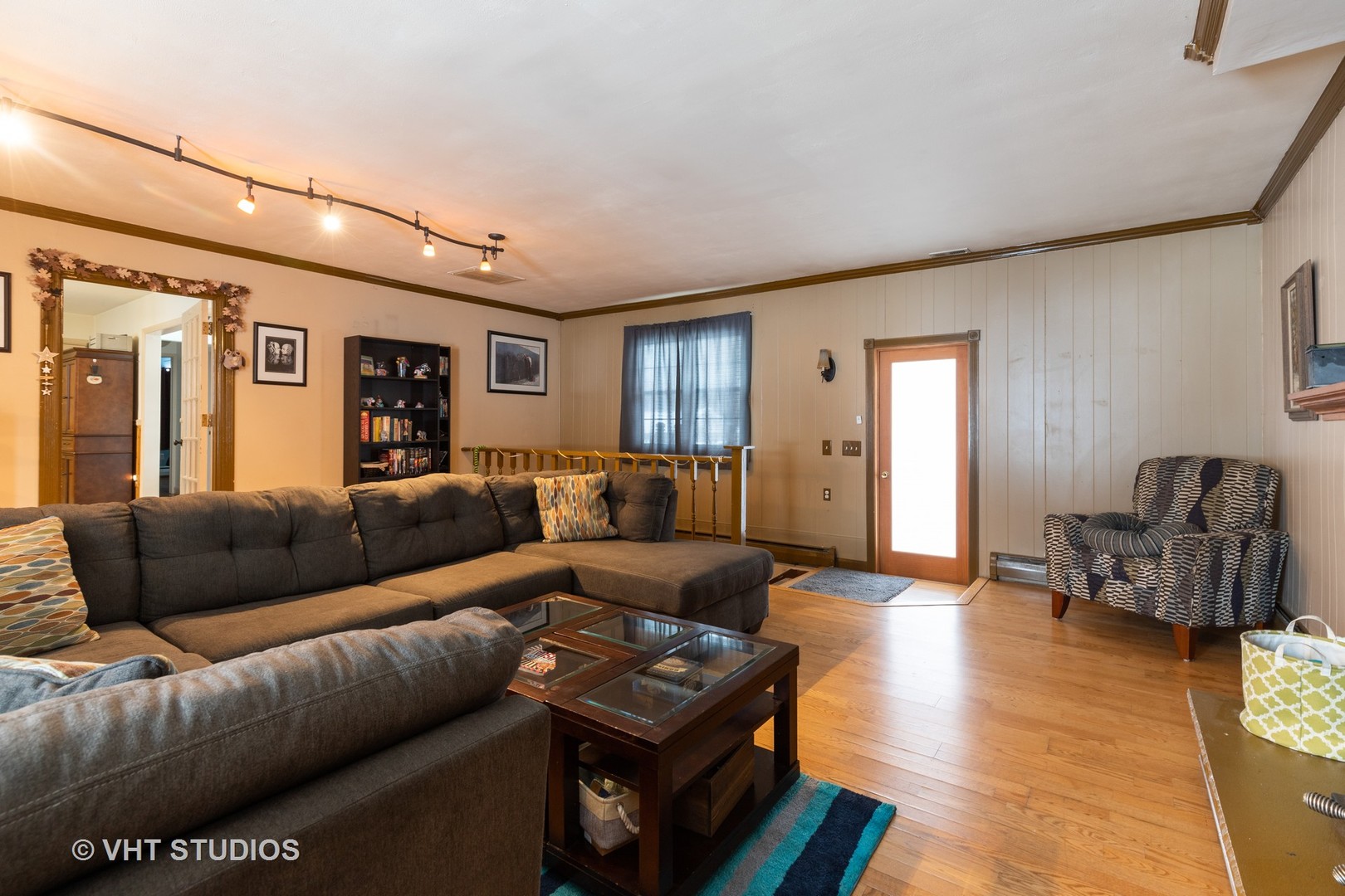 26649 West Wilmot Road Antioch, IL 60002 - Photo 7 of 13 a living room with furniture and wooden floor