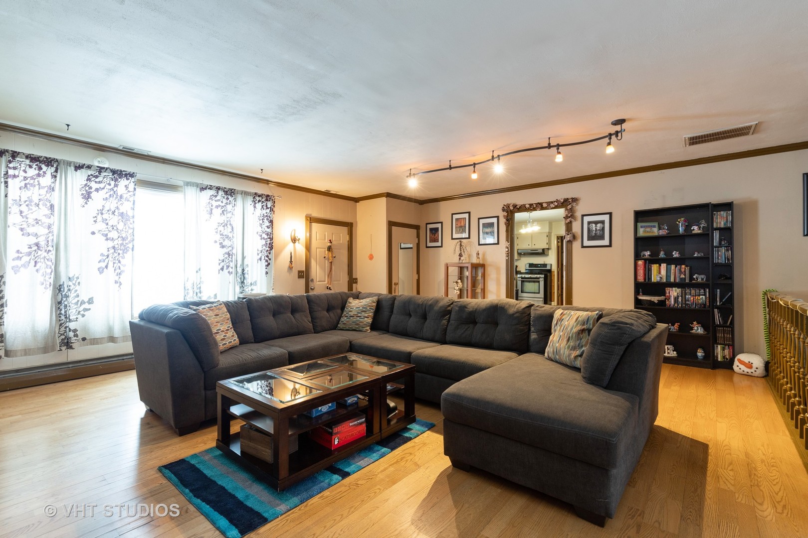 26649 West Wilmot Road Antioch, IL 60002 - Photo 8 of 13 a living room with furniture and a couch