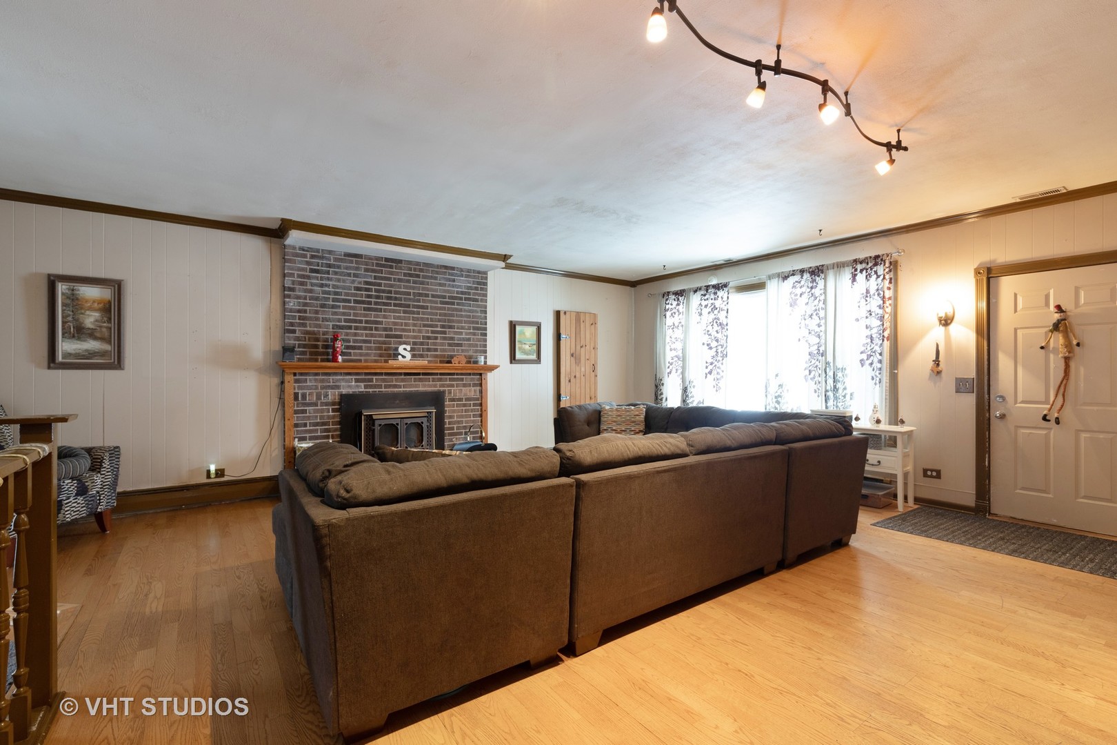 26649 West Wilmot Road Antioch, IL 60002 - Photo 9 of 13 a living room with furniture window and a flat screen tv